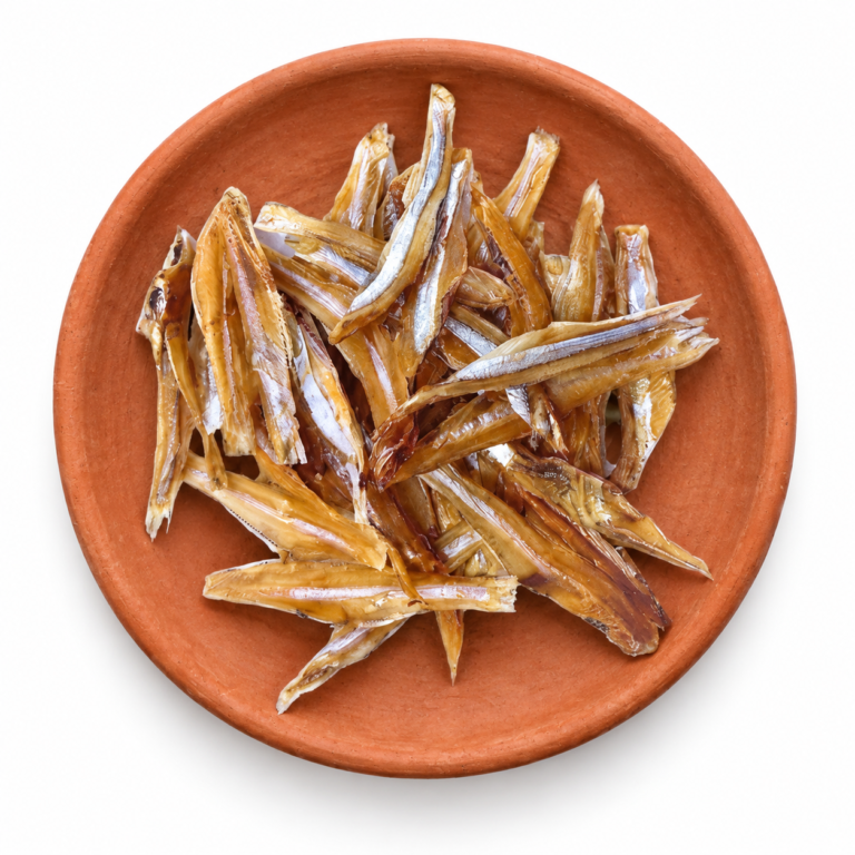 Dried Anchovy (Headless) on a Kerala clay plate against white
