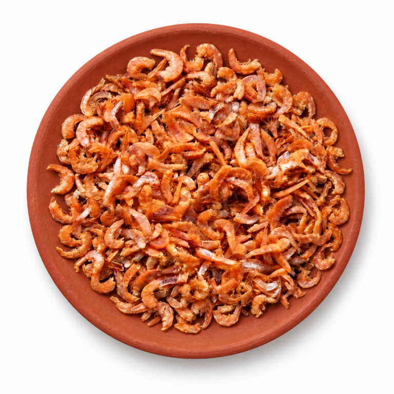 Dried Prawns (Headless) on a Kerala clay plate against white