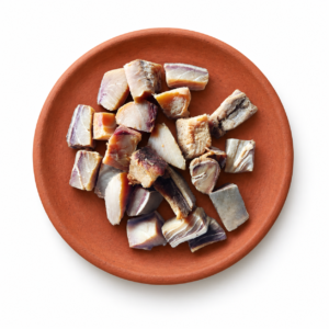Dried Shark Fish on a Kerala clay plate against white